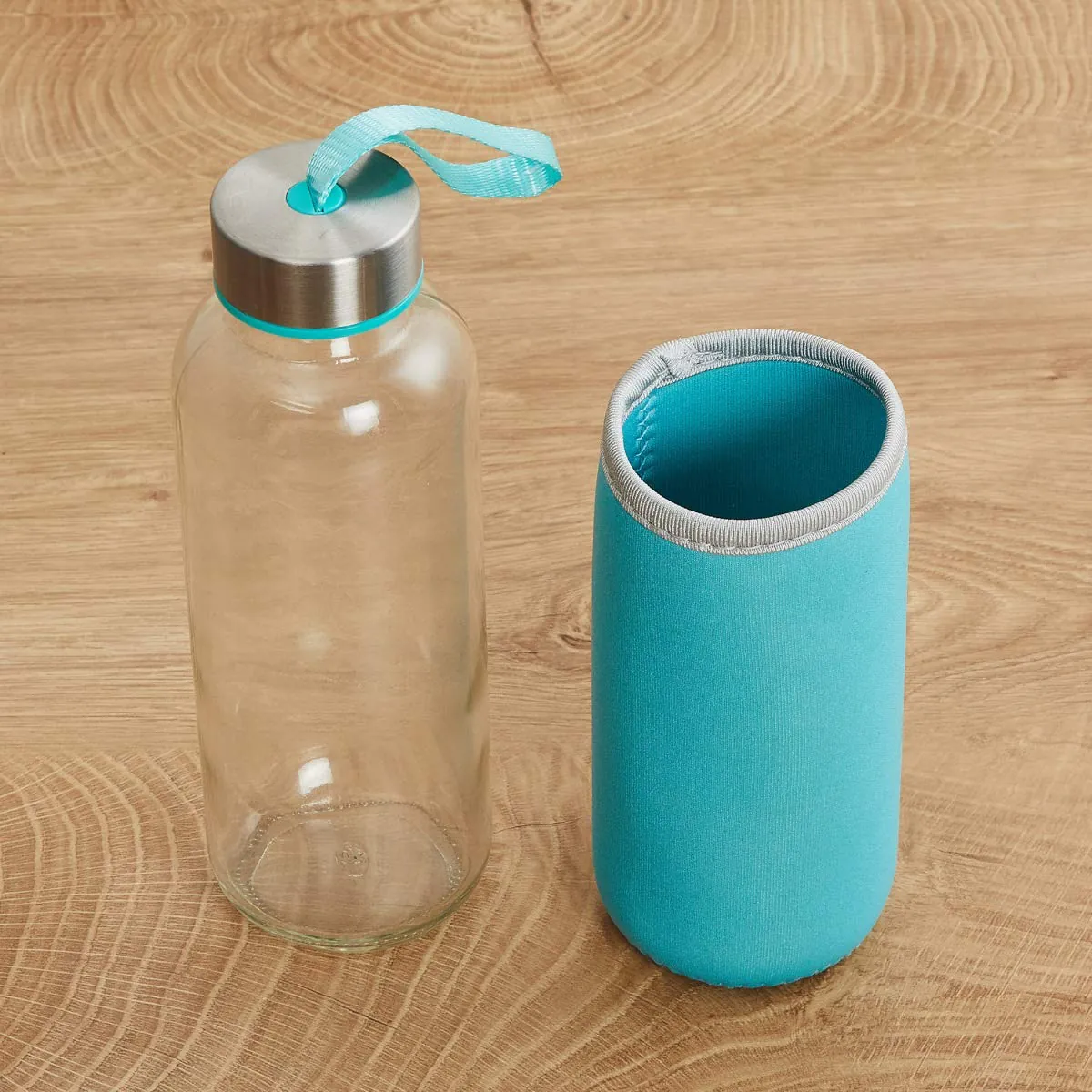 Glass water bottle with sleeve